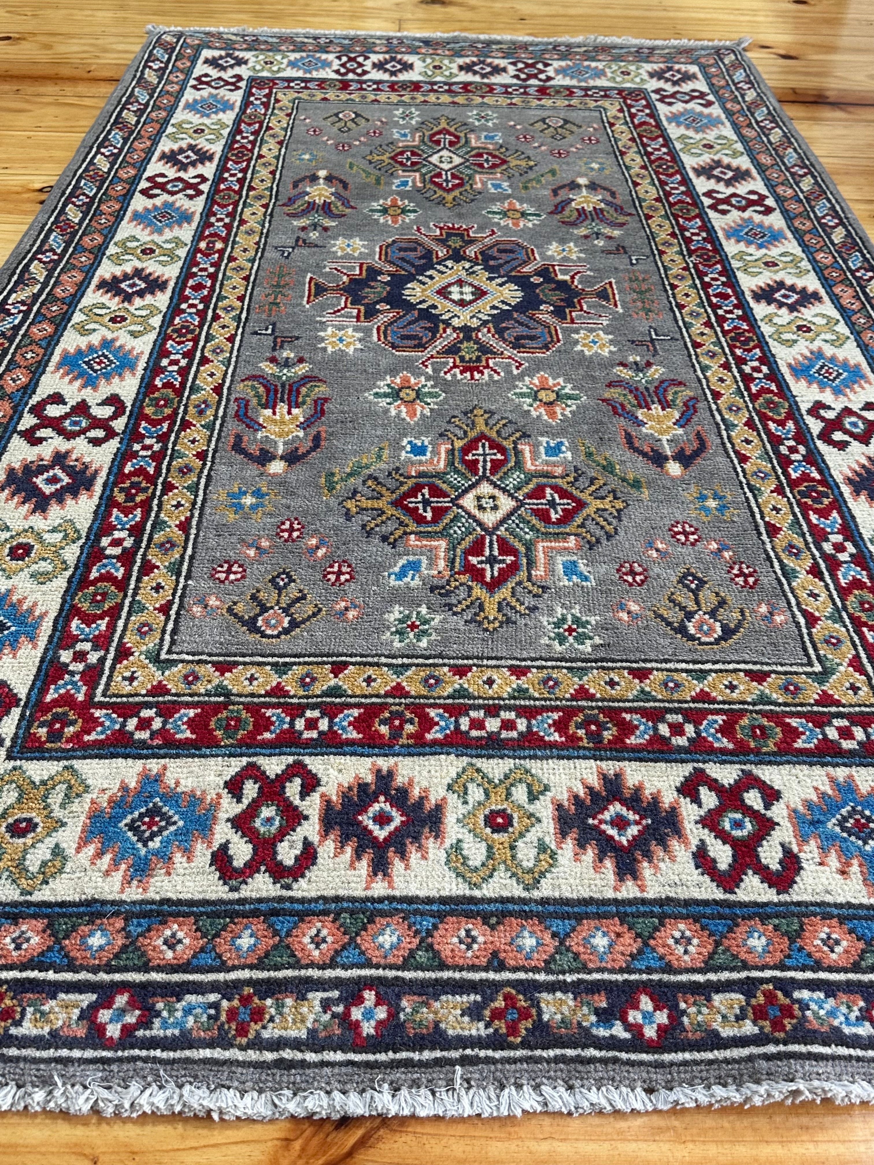 Handmade Afghan Traditional Kazak Wool Rug – 164 CM x 92 CM