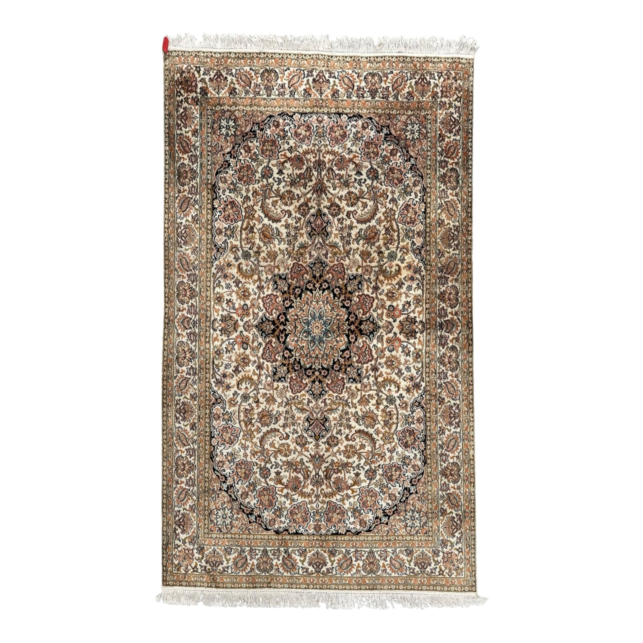 A traditional oriental-style area rug with an intricate floral pattern, featuring a central medallion, detailed borders, and white fringe on the top and bottom edges.
